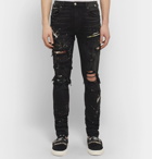 AMIRI - Skinny-Fit Appliquéd Paint-Splattered Distressed Stretch-Denim Jeans - Black