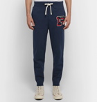 Polo Ralph Lauren - Tapered Appliquéd Fleece-Back Cotton-Blend Jersey Sweatpants - Men - Navy