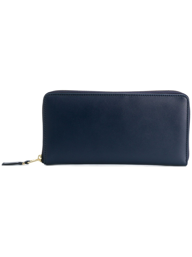Photo: Comme des Garcons Wallets Classic Leather Line Wallet in Blue