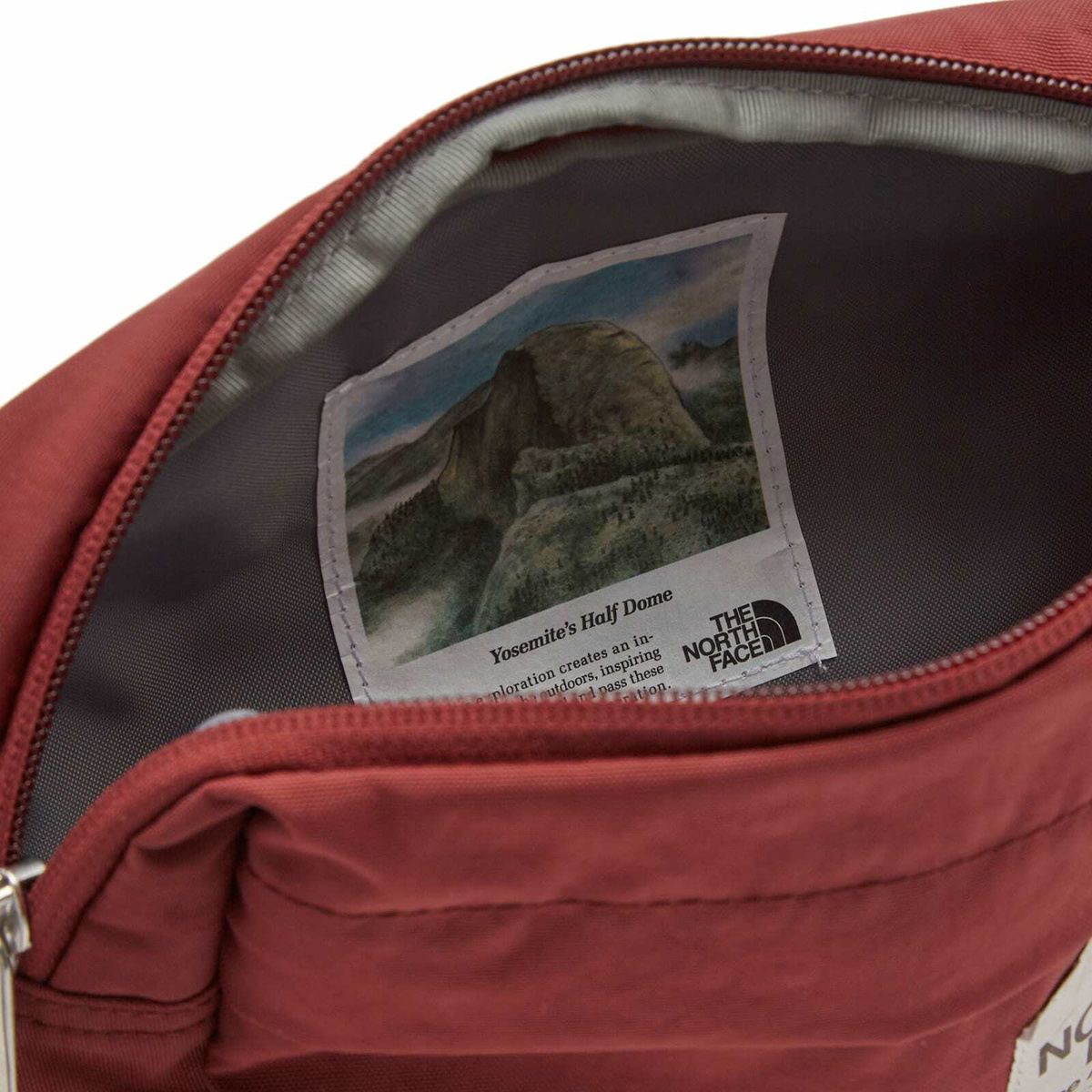 The North Face Women's Berkeley Lumbar Crossbody Bag in Sumac/Alpine Plum 