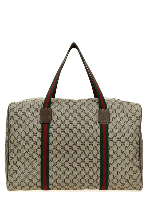 Photo: Gucci gg Supreme Duffel Bag