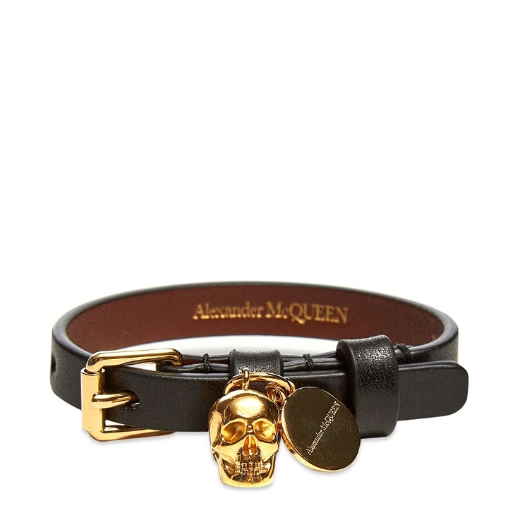 Photo: Alexander McQueen Men's Single Wrap Skull Bracelet in Black/Gold