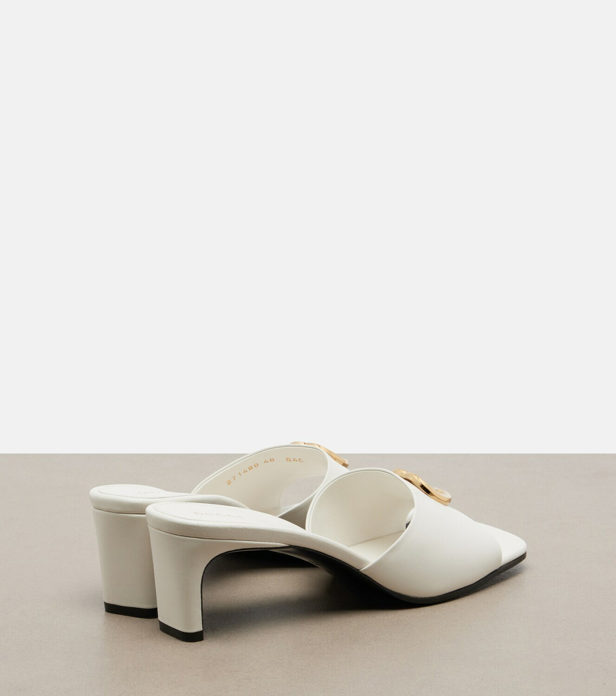 Gucci Double G leather mules