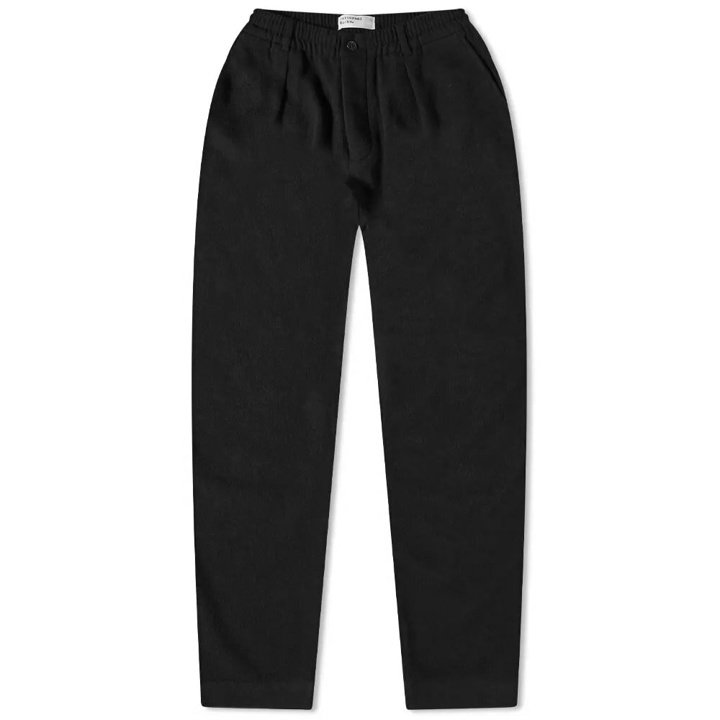 Photo: Universal Works Men's Soft Wool Pleated Track Pant in Black