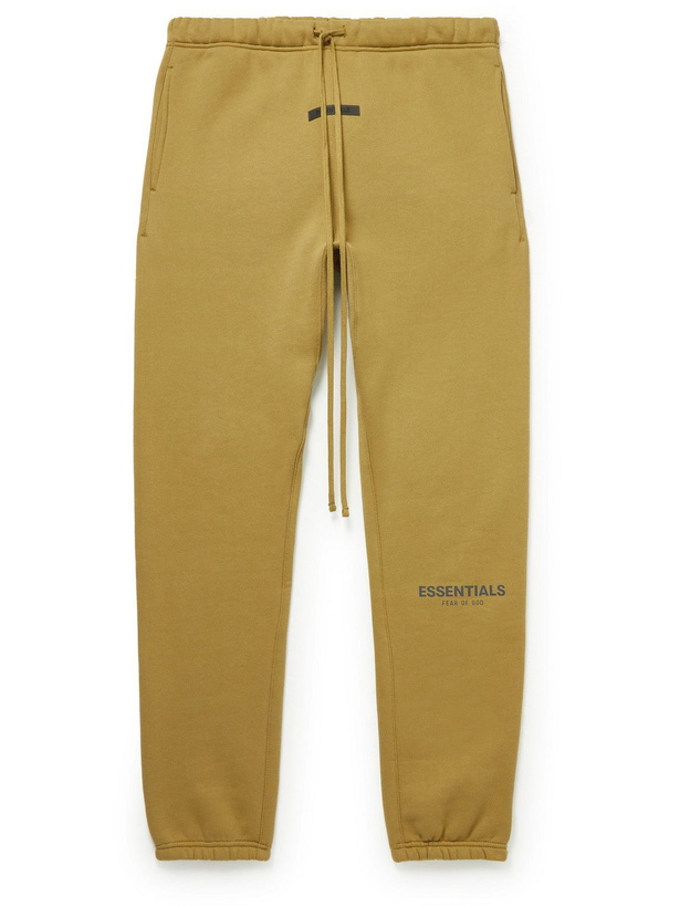 Photo: Fear of God Essentials - Tapered Logo-Print Cotton-Blend Jersey Sweatpants - Yellow