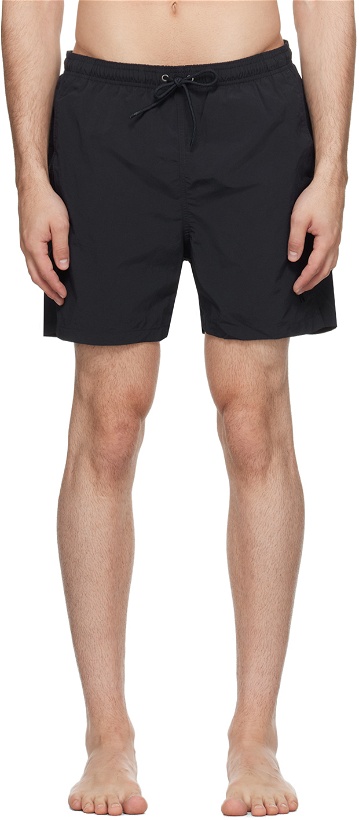 Photo: NORSE PROJECTS Navy Hauge Swim Shorts