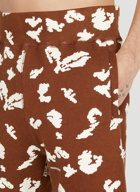 Undercover - Graphic Print Track Pants in Brown