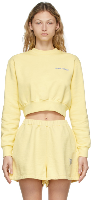 Photo: Opening Ceremony Yellow Word Torch Cropped Sweatshirt