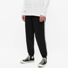 Fred Perry Men's Taped Track Pant in Black