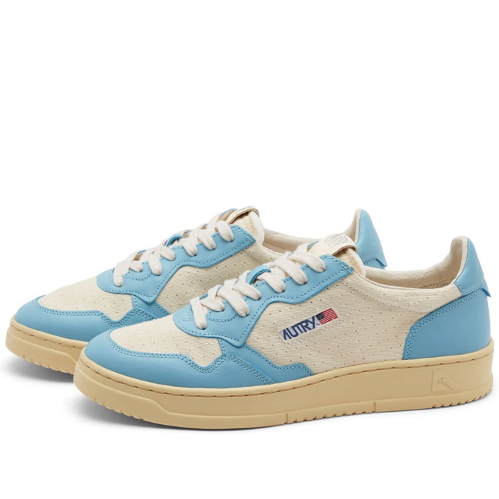 Photo: Autry Men's Medalist Low Canvas Sneakers in White/Sky