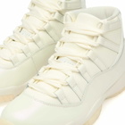 Air Jordan Women's 11 Retro W Sneaker in Sail/Pearl Grey/White/Mtlc Silver
