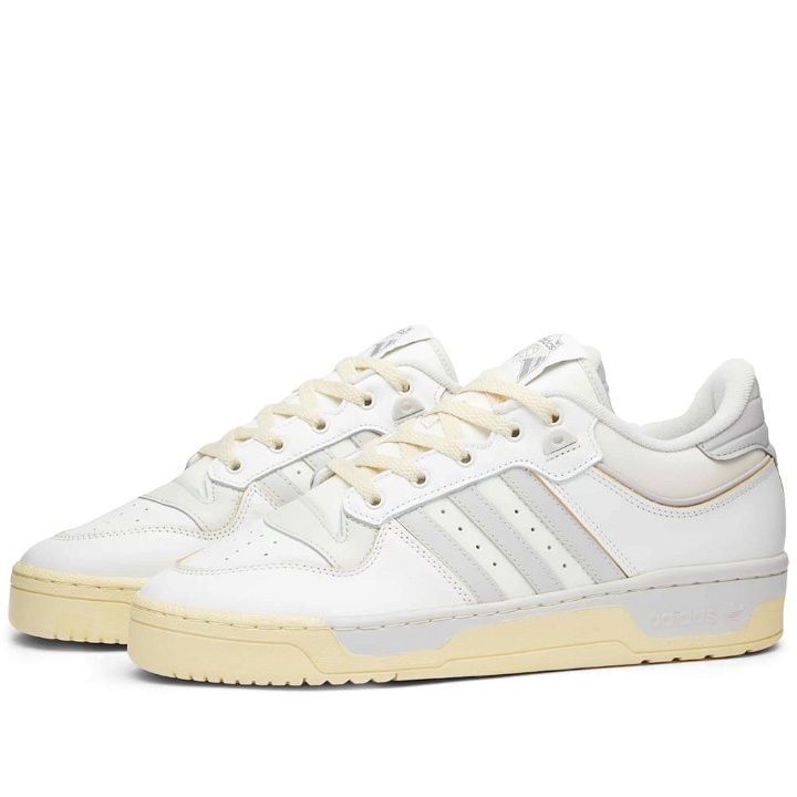 Photo: Adidas Men's Rivalry Low 86 Sneakers in White/Grey/Off White