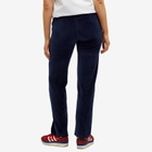 Sporty & Rich Women's NY Crest Velour Track Pants in Navy Cream