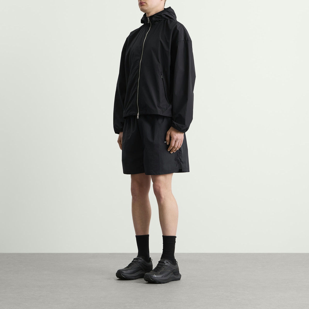 MKI Men's Hyperlight Hooded Wind Jacket in Black