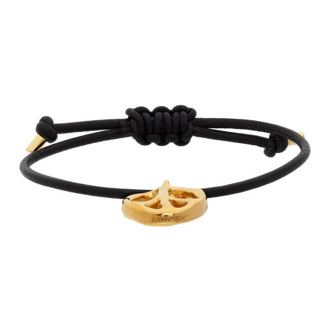 Photo: Ambush Black and Gold Leather Peace Bracelet