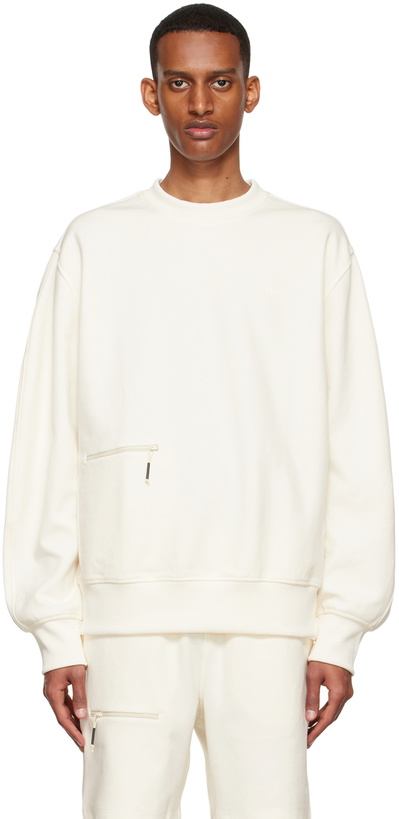 Photo: RAINS Off-White Cotton Sweatshirt