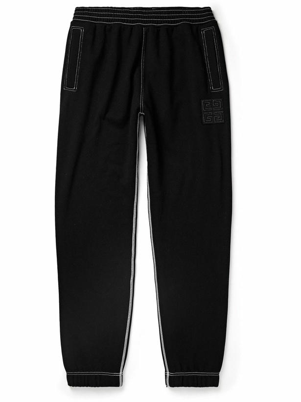 Photo: Givenchy - Tapered Logo-Appliquéd Cotton-Jersey Sweatpants - Black
