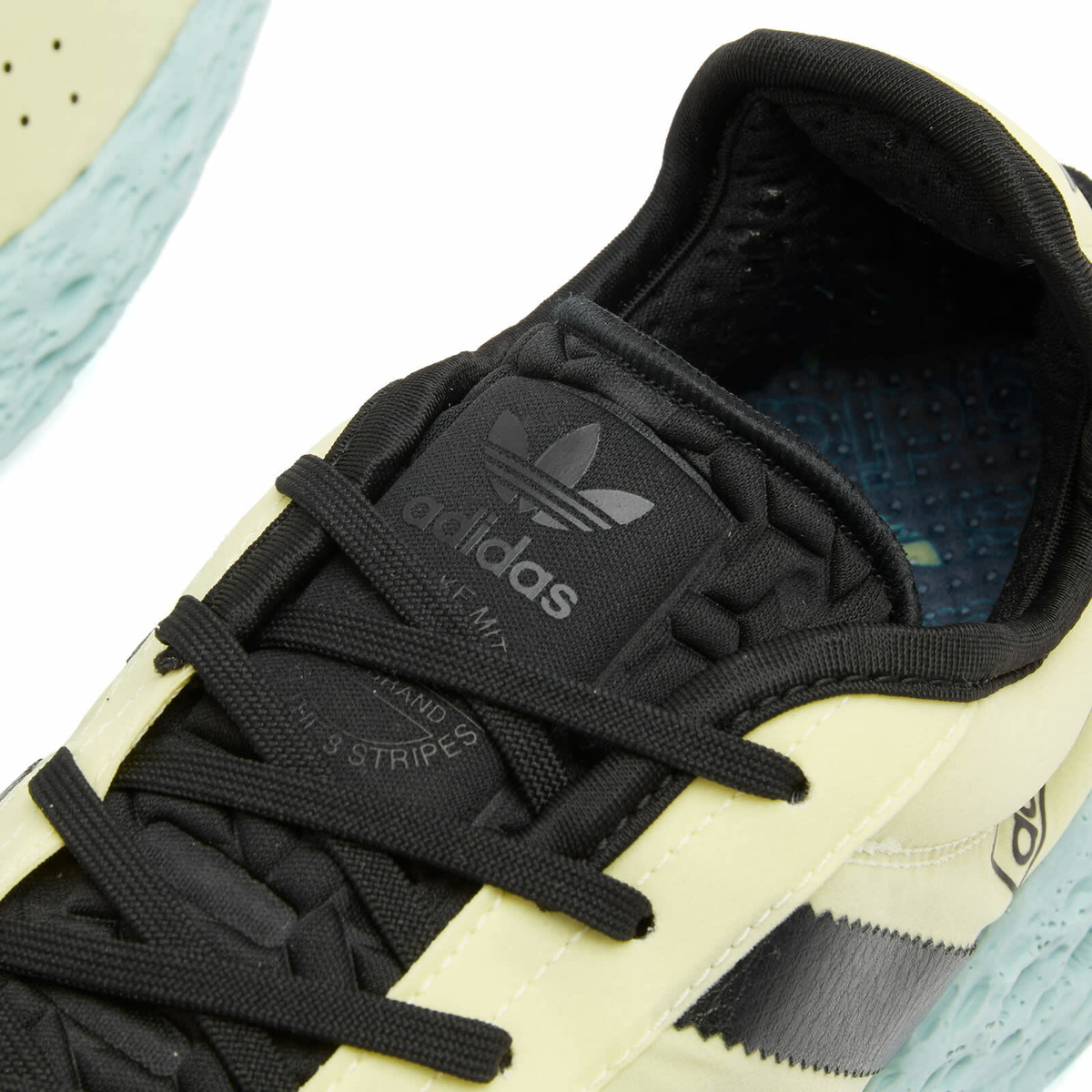 Adidas Men's Zponge Sneaker in Ice Yellow/Core Black/Focus Blue