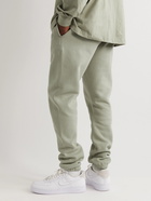 FEAR OF GOD ESSENTIALS - Slim-Fit Tapered Logo-Flocked Cotton-Blend Jersey Sweatpants - Green