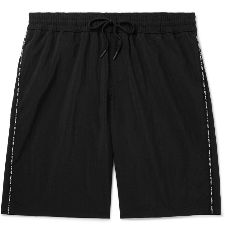 Photo: Versace - Long-Length Logo-Print Swim Shorts - Black