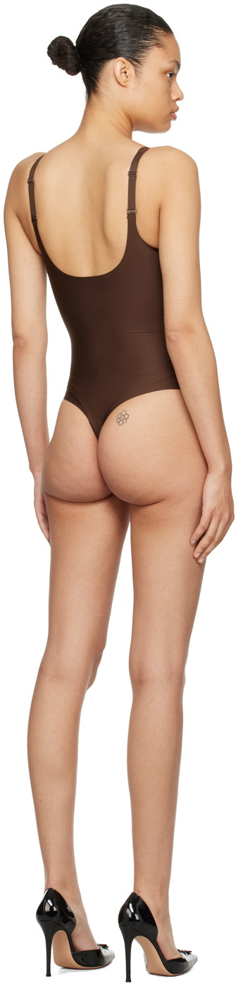 SKIMS BODY UNLINED PLUNGE MID THIGH BODYSUIT | BRONZE