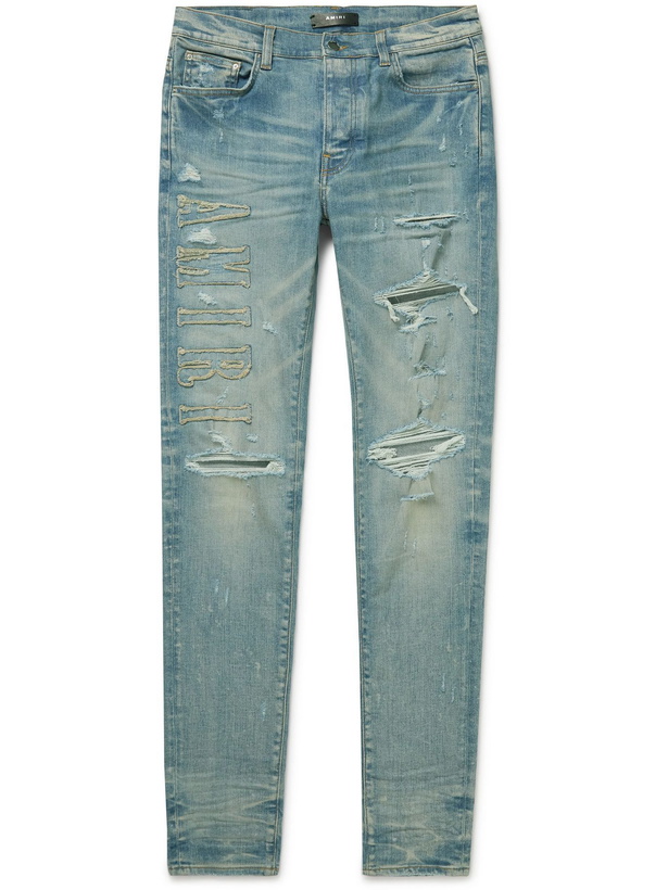 Photo: AMIRI - Skinny-Fit Logo-Appliquéd Distressed Jeans - Blue