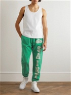 SAINT Mxxxxxx - Collegiate Tapered Logo-Print Cotton-Jersey Sweatpants - Green