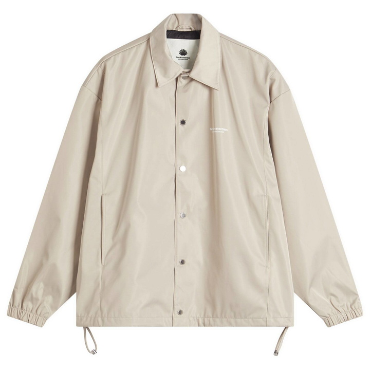 Photo: New Amsterdam Surf Association Men's Logo Coach Jacket in Warm Sand