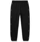 MONCLER - Tapered Logo-Print Loopback Cotton-Jersey Sweatpants - Black