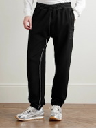 Givenchy - Tapered Logo-Appliquéd Cotton-Jersey Sweatpants - Black