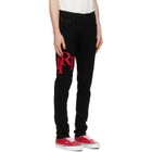 AMIRI Black Staggered Logo Skinny Jeans