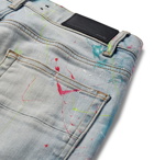 AMIRI - Skinny-Fit Distressed Paint-Splattered Stretch-Denim Jeans - Light denim