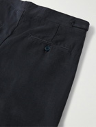 Stòffa - Tapered Pleated Cotton-Canvas Trousers - Blue