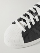 adidas Originals - Superstar 82 Rubber-Trimmed Pebble-Grain Leather Sneakers - Black