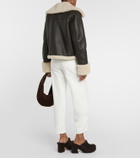 CO Shearling-trimmed leather biker jacket