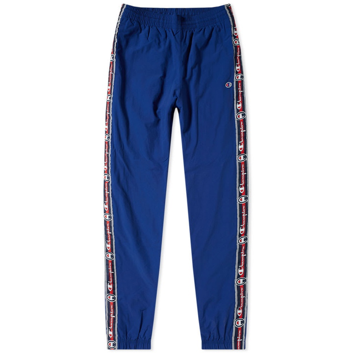 Photo: Champion Reverse Weave Corporate Taped Track Pant