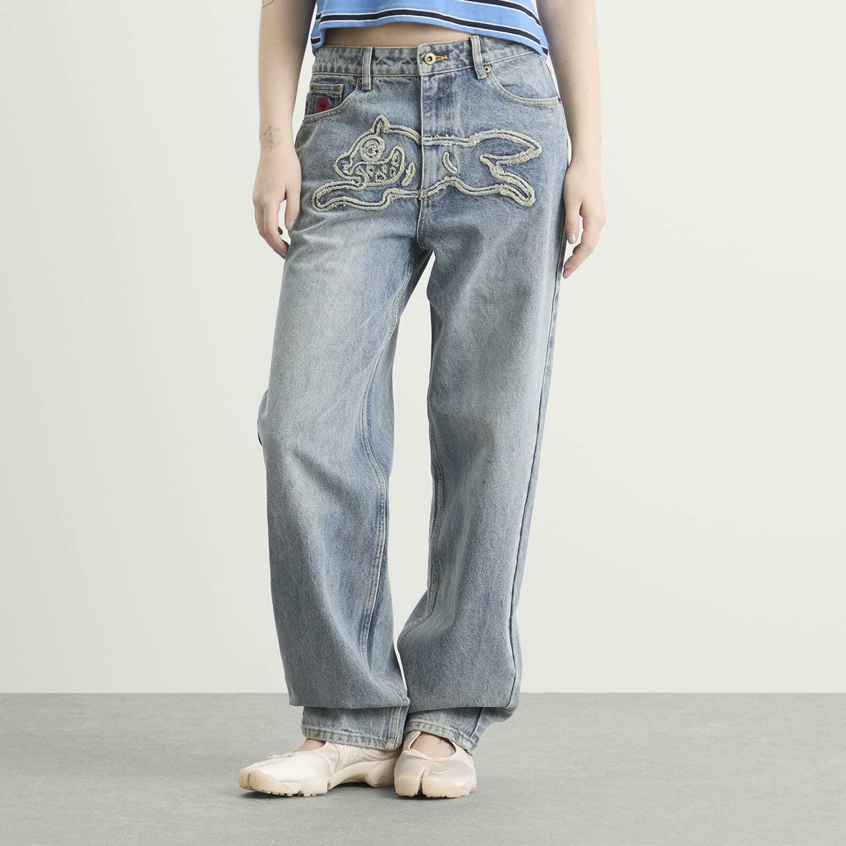 ICECREAM Women's Distressed Running Dog Denim Pants in Vintage Wash