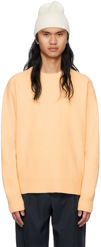 Photo: Jil Sander Orange Oversized Sweater