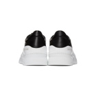 Common Projects Black and White Cross Trainer Sneakers