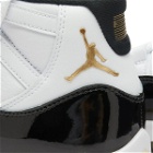 Air Jordan 11 Retro Sneakers in White/Metallic Gold/Black