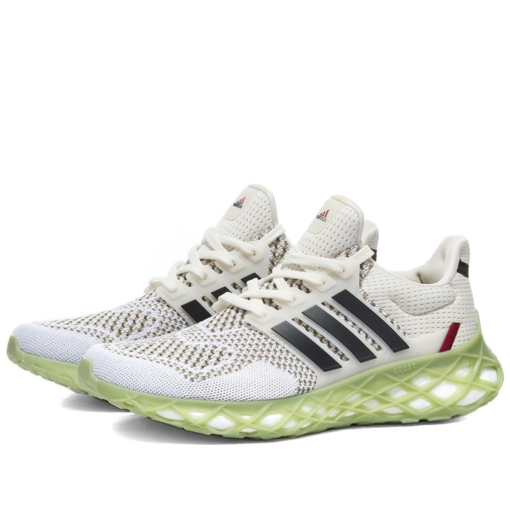 Photo: Adidas Men's Ultraboost Web DNA Sneakers in Core White/Carbon/Orbit Green
