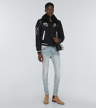 Amiri - Stack low-rise skinny jeans