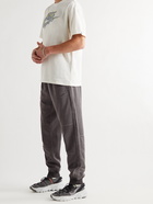 NIKE - Tapered Logo-Embroidered Panelled Recycled Jersey Sweatpants - Gray