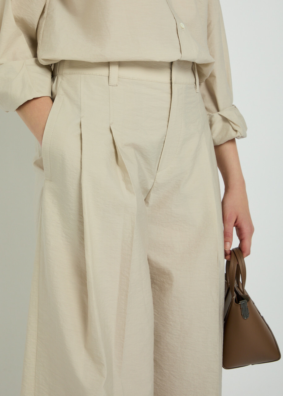Brunello Cucinelli Crinkled Cotton-blend Trousers Beige