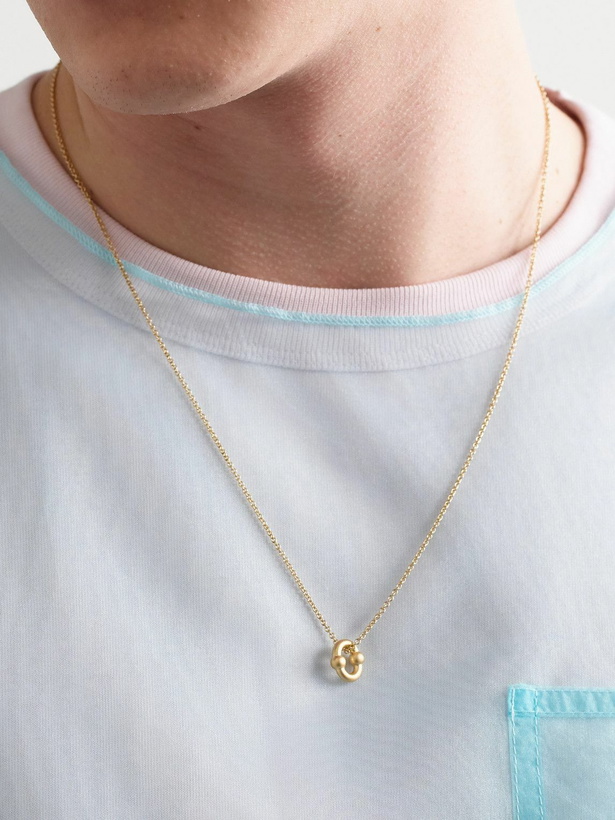 Photo: Greg Yuna - Umlaut Mini 18-Karat Gold Pendant