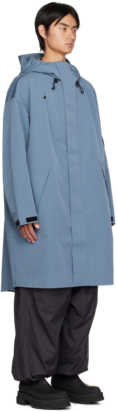 A. A. Spectrum Blue Flowted Rain Coat
