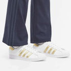 Adidas Men's Superstar W Sneakers in White/Gold