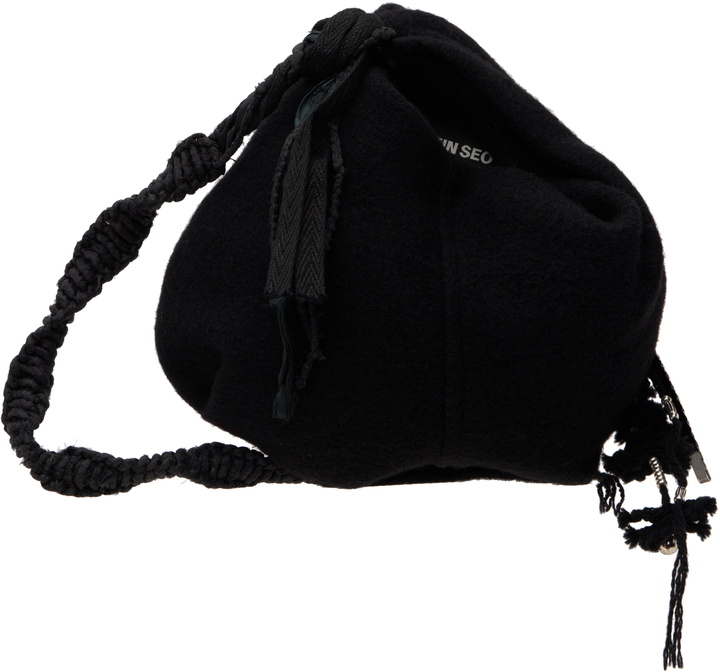 Photo: HYEIN SEO Black Tassel Charm Mini Bag