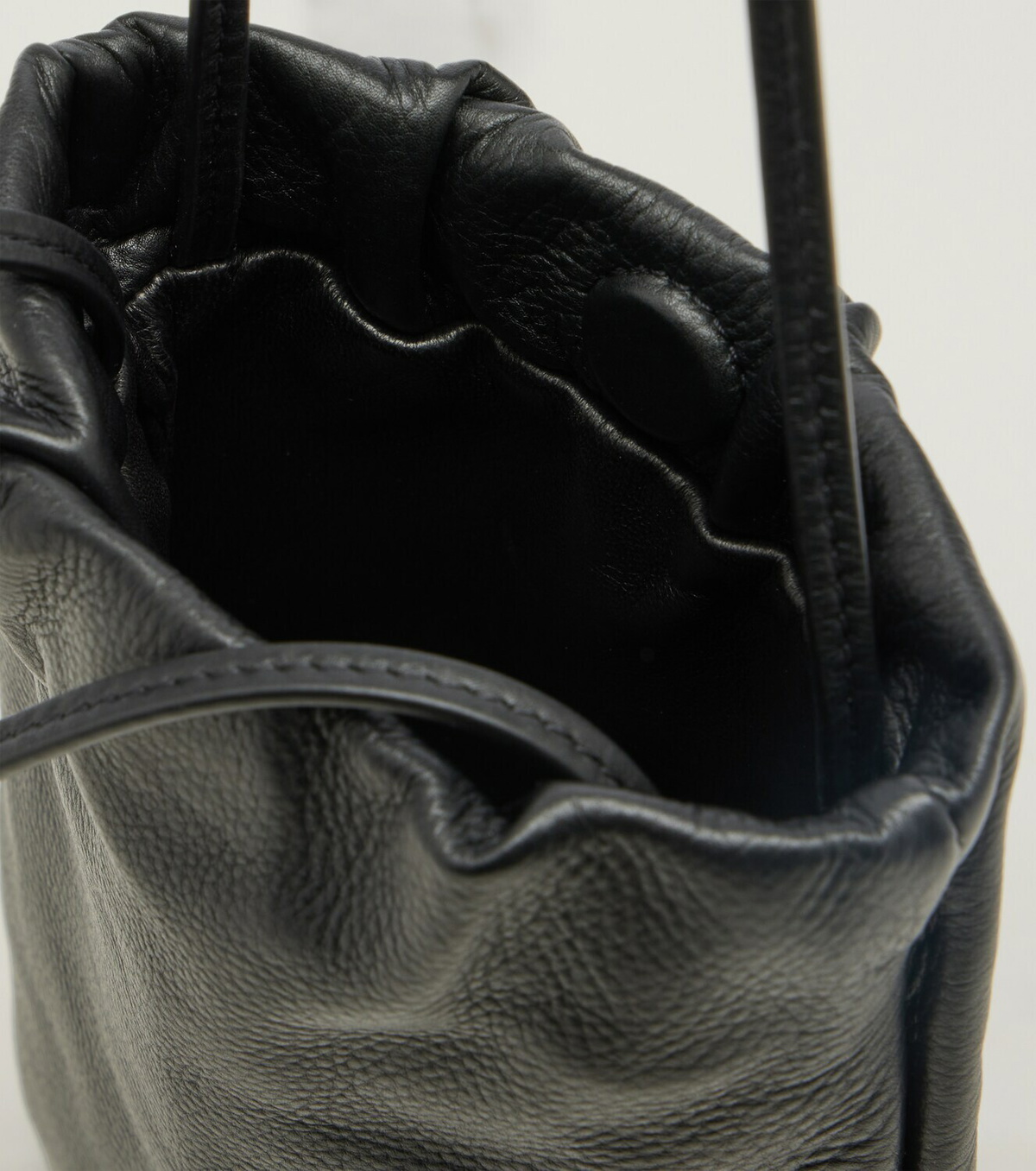 The Row Bourse leather phone pouch
