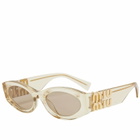 Miu Miu Eyewear Women's 11WS Sunglasses in Sand Transparent/Dark Brown 
